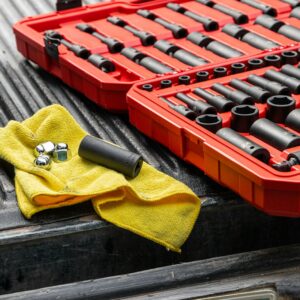 yellow textile on red and black plastic crate